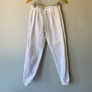 ARITZIA TNA Cozy AF white track pants joggers